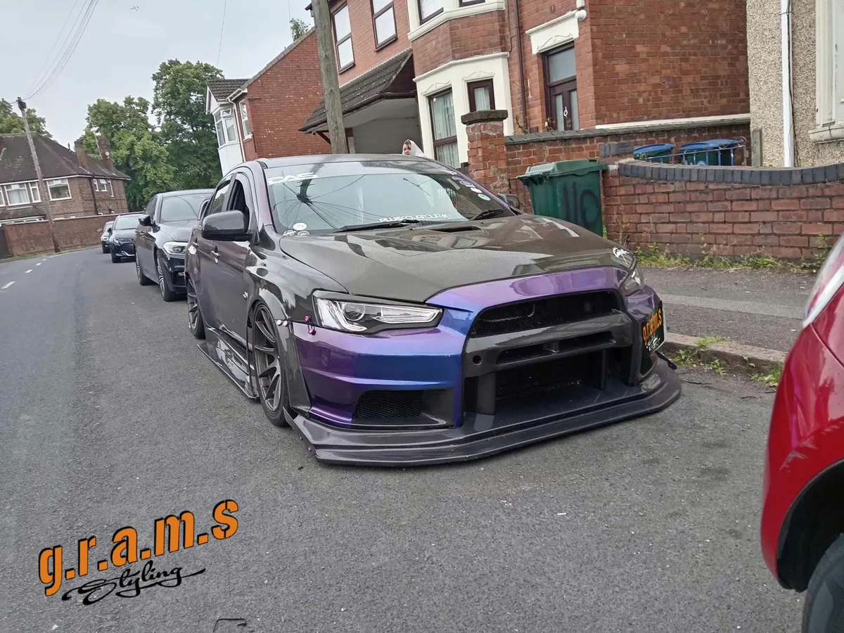 Mitsubishi Lancer Evolution X Front Bumper - Varis Style, photo 3 of 23