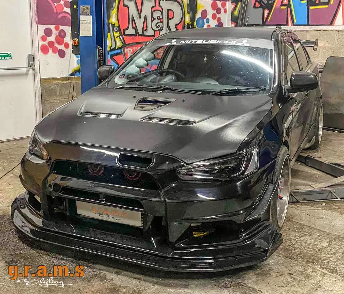 Mitsubishi Lancer Evolution X Front Bumper - Varis Style, photo 2 of 23